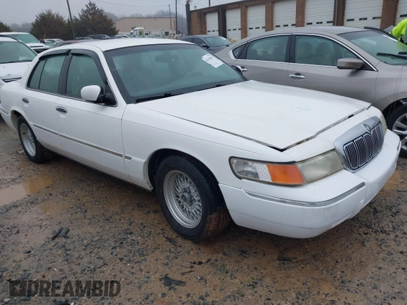 2001 Mercury Grand Marquis LS with VIN 2MEFM75W41X672360, listed as a IAAI auction lot 41418594 with 73,717 mi miles and . Bid and sale history available at DreamBid. Image 1.