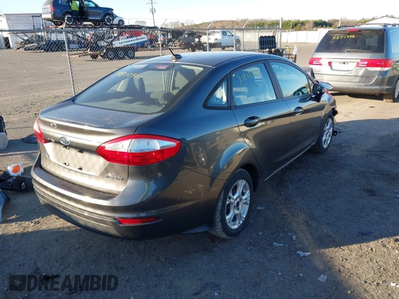 2015 Ford Fiesta SE with VIN 3FADP4BJ7FM132873, listed as a IAAI auction lot 41812405 with 180,522 mi miles. Bid and sale history available at carsss.com. Image 4.