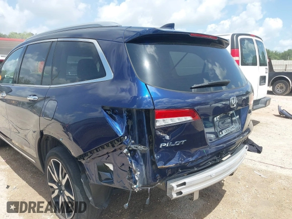 2022 Honda Pilot Touring 7-Passenger with VIN 5FNYF5H61NB019768, listed as a IAAI auction lot 42438780 with Not provided miles and . Bid and sale history available at DreamBid. Image 6.