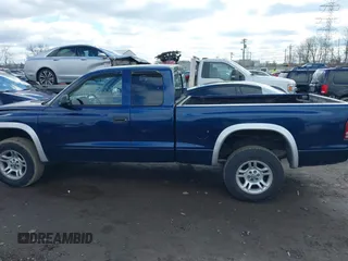 2004 Dodge Dakota SLT with VIN 1D7HG42N44S519910, listed as a IAAI auction lot 41737881 with 154,008 mi miles. Bid and sale history available at carsss.com. Image 14.