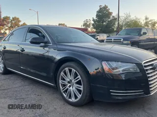2013 Audi A8 3.0L z VIN WAURGAFD4DN004450, wystawiony jako Copart lot #57666585 z przebiegiem 122 835 mil mil oraz Czysty tytuł • Clean title. Historia ofert i sprzedaży dostępna na DreamBid. Obrazek 1.