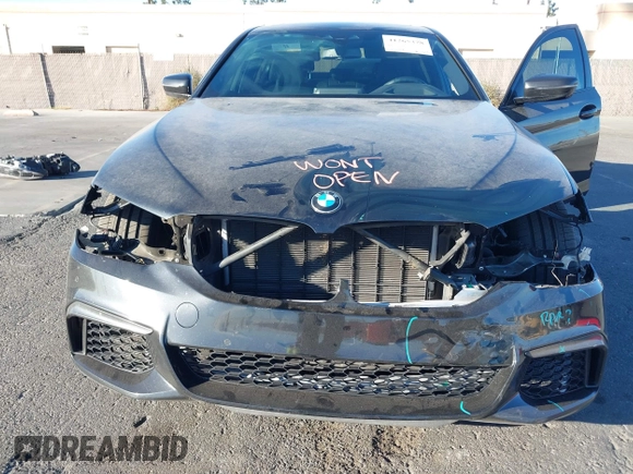 2019 BMW 5 Series M550i xDrive with VIN WBAJB9C51KB288416, listed as a IAAI auction lot 41265378 with 52,529 mi miles and . Bid and sale history available at DreamBid. Image 6.