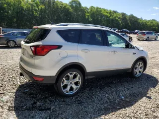 2019 Ford Escape Titanium with VIN 1FMCU9J97KUA21390, listed as a Copart auction lot 57640175 with 51,254 mi miles and Salvage title. Bid and sale history available at DreamBid. Image 3.
