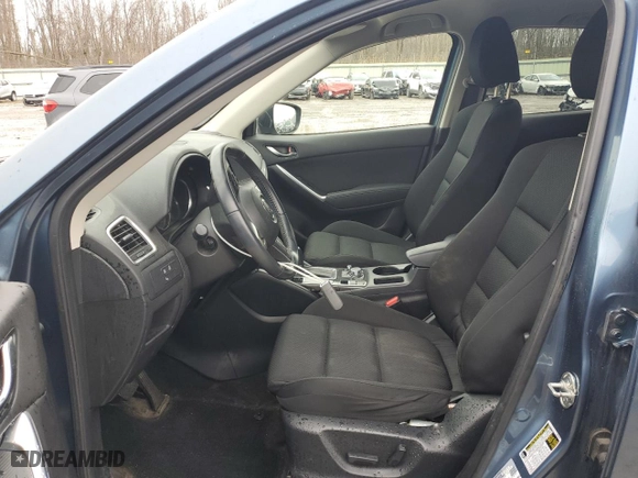 2016 Mazda CX-5 Touring with VIN JM3KE4CY4G0778032, listed as a Copart auction lot 52769065 with 81,443 mi miles and Salvage Title. Bid and sale history available at carsss.com. Image 7.