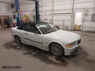 1997 BMW 3-Series 328IC with VIN WBABK832XVET95942, listed as a IAAI auction lot 41246303 with 165,825 mi miles. Bid and sale history available at carsss.com. Image 13.