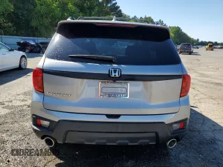 2022 Honda Passport EX-L z VIN 5FNYF7H59NB003482, wystawiony jako Copart lot #55460425 z przebiegiem 32 321 mil mil oraz Szkody całkowita. Historia ofert i sprzedaży dostępna na DreamBid. Obrazek 6.