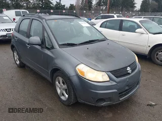 2008 Suzuki SX4 Regional Edition Touring with VIN JS2YA413285102839, listed as a IAAI auction lot 41473669 with 102,914 mi miles. Bid and sale history available at carsss.com. Image 1.