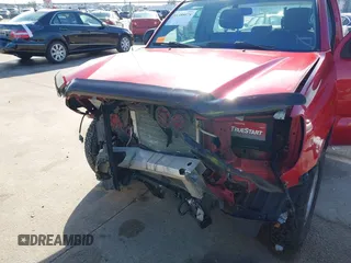 2014 Toyota Tacoma with VIN 5TFNX4CN0EX033496, listed as a IAAI auction lot 41388678 with 190,596 mi miles and . Bid and sale history available at DreamBid. Image 6.