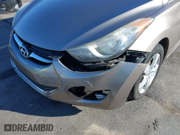 2013 Hyundai Elantra GLS z VIN 5NPDH4AE7DH174538, wystawiony jako IAAI lot #41428026 z przebiegiem 158 066 mil mil oraz . Historia ofert i sprzedaży dostępna na DreamBid. Obrazek 6.