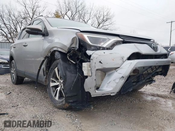 2018 Toyota RAV4 XLE with VIN 2T3RFREV1JW842728, listed as a IAAI auction lot 41519668 with 149,670 mi miles. Bid and sale history available at carsss.com. Image 6.