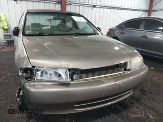 1998 Mazda Protege DX with VIN JM1BC141XW0200689, listed as a IAAI auction lot 41540162 with 172,311 mi miles and . Bid and sale history available at DreamBid. Image 6.