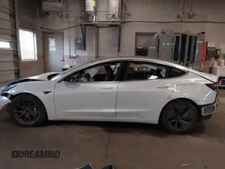 2020 Tesla Model 3 Long Range z VIN 5YJ3E1EB7LF619120, wystawiony jako IAAI lot #41334485 z przebiegiem Nie podano mil oraz . Historia ofert i sprzedaży dostępna na DreamBid. Obrazek 15.