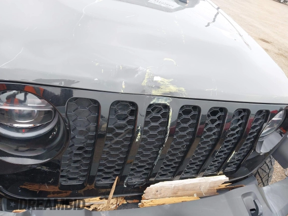 2022 Jeep Gladiator Texas Trail z VIN 1C6HJTAG2NL176011, wystawiony jako IAAI lot #42193864 z przebiegiem 27 219 mil mil oraz . Historia ofert i sprzedaży dostępna na DreamBid. Obrazek 21.