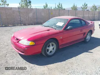 1998 Ford Mustang z VIN 1FAFP4047WF257717, wystawiony jako IAAI lot #42505127 z przebiegiem 185 244 mil mil oraz . Historia ofert i sprzedaży dostępna na DreamBid. Obrazek 2.