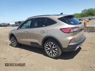 2020 Ford Escape SE Sport Hybrid z VIN 1FMCU9BZ7LUB14362, wystawiony jako Copart lot #57302285 z przebiegiem 103 337 mil mil oraz Szkoda całkowita • Salvage title. Historia ofert i sprzedaży dostępna na DreamBid. Obrazek 2.