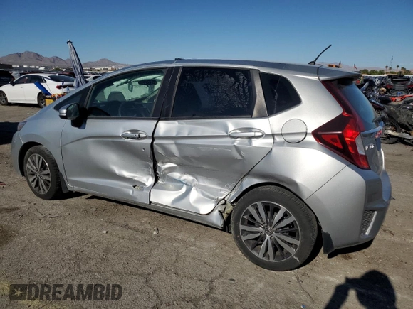 2015 Honda Fit EX-L z VIN 3HGGK5H8XFM766048, wystawiony jako Copart lot #56436135 z przebiegiem 67 587 mil mil oraz Szkoda całkowita • Salvage title. Historia ofert i sprzedaży dostępna na DreamBid. Obrazek 2.