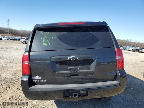 2019 Chevrolet Tahoe LT with VIN 1GNSCBKC5KR353908, listed as a Copart auction lot 41826985 with 97,949 mi miles and Clean Title. Bid and sale history available at carsss.com. Image 6.