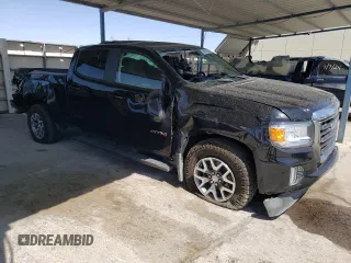 2021 GMC Canyon 4WD AT4 w/Cloth with VIN 1GTG6FEN0M1273816, listed as a Copart auction lot 65976804 with 28,082 mi miles and Salvage Title. Bid and sale history available at carsss.com. Image 4.