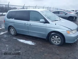 2004 Honda Odyssey EX-RES z VIN 5FNRL18814B135705, wystawiony jako IAAI lot #41154354 z przebiegiem 239 658 mil mil oraz . Historia ofert i sprzedaży dostępna na DreamBid. Obrazek 1.