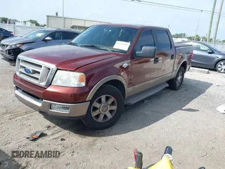 2005 Ford F-150 XLT with VIN 1FTPW12535KE05731, listed as a IAAI auction lot 42496388 with 210,545 mi miles and . Bid and sale history available at DreamBid. Image 2.