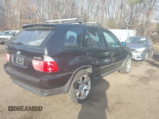 2003 BMW X5 4.4i with VIN 5UXFB33543LH43200, listed as a IAAI auction lot 41652303 with 169,250 mi miles. Bid and sale history available at carsss.com. Image 4.