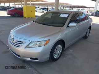 2009 Toyota Camry with VIN 4T4BE46K69R096427, listed as a IAAI auction lot 42150328 with 170,970 mi miles. Bid and sale history available at carsss.com. Image 2.