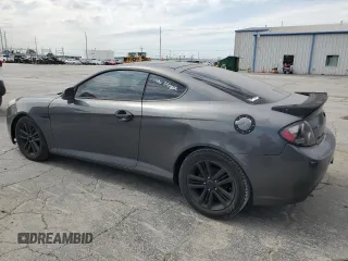 2007 Hyundai Tiburon GS z VIN KMHHM66D47U243846, wystawiony jako Copart lot #57509725 z przebiegiem 181 941 mil mil oraz Szkoda całkowita • Salvage title. Historia ofert i sprzedaży dostępna na DreamBid. Obrazek 2.