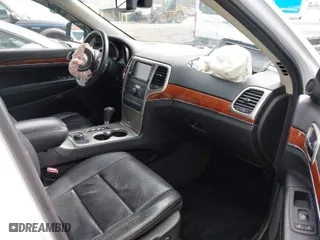 2013 Jeep Grand Cherokee Limited with VIN 1C4RJFBT0DC619216, listed as a IAAI auction lot 41703137 with 142,577 mi miles. Bid and sale history available at carsss.com. Image 5.