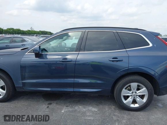 2022 Volvo XC60 Momentum z VIN YV4L12RKXN1052826, wystawiony jako IAAI lot #41869228 z przebiegiem 30 044 mil mil oraz . Historia ofert i sprzedaży dostępna na DreamBid. Obrazek 15.