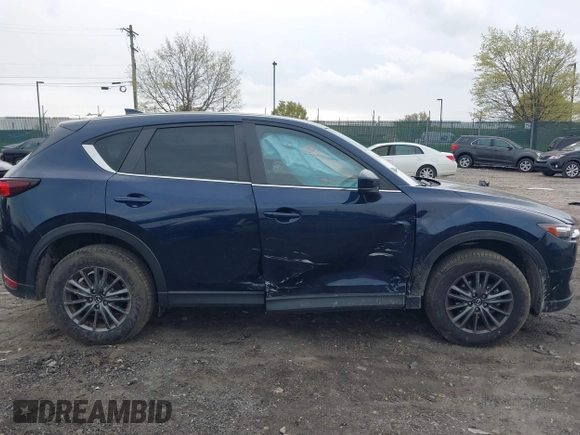 2021 Mazda CX-5 Touring with VIN JM3KFBCM1M1336457, listed as a IAAI auction lot 42034330 with 39,910 mi miles. Bid and sale history available at carsss.com. Image 12.