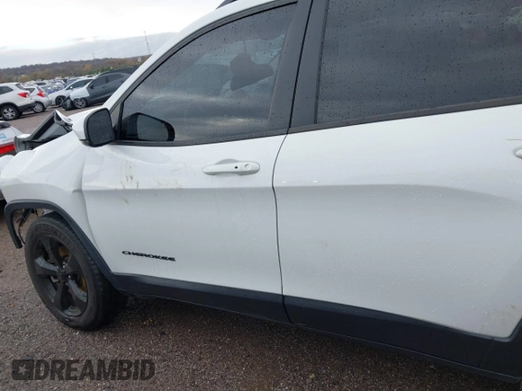 2016 Jeep Cherokee Latitude with VIN 1C4PJMCSXGW214243, listed as a IAAI auction lot 40850362 with 96,240 mi miles and . Bid and sale history available at carsss.com. Image 14.