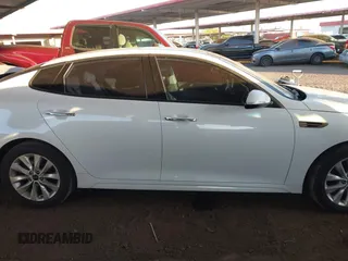 2016 Kia Optima EX with VIN 5XXGU4L30GG117411, listed as a IAAI auction lot 42034988 with 123,387 mi miles. Bid and sale history available at carsss.com. Image 13.