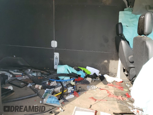 2023 Ford Transit Cargo with VIN 1FTBR1C86PKA83003, listed as a Copart auction lot 51015344 with Not Provided miles and Salvage Title. Bid and sale history available at DreamBid. Image 12.