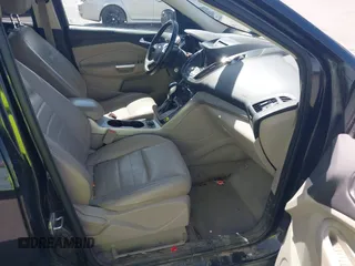 2013 Ford Escape SEL with VIN 1FMCU0H98DUB16061, listed as a IAAI auction lot 42046687 with 204,913 mi miles. Bid and sale history available at carsss.com. Image 5.