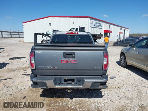 2019 GMC Canyon 4WD SLE with VIN 1GTG6CEN2K1102111, listed as a IAAI auction lot 41938971 with 156,260 mi miles and . Bid and sale history available at carsss.com. Image 16.
