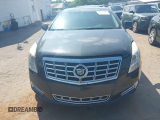 2013 Cadillac XTS Luxury z VIN 2G61P5S37D9110658, wystawiony jako IAAI lot #42196442 z przebiegiem 182 228 mil mil oraz . Historia ofert i sprzedaży dostępna na DreamBid. Obrazek 13.