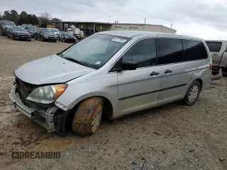 2009 Honda Odyssey LX with VIN 5FNRL38259B032155, listed as a Copart auction lot 45771095 with Not provided miles and Salvage title. Bid and sale history available at DreamBid. Image 1.