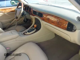 2001 Jaguar XJ Vanden Plas with VIN SAJDA24C81LF23026, listed as a IAAI auction lot 42671098 with 83,759 mi miles and . Bid and sale history available at DreamBid. Image 5.
