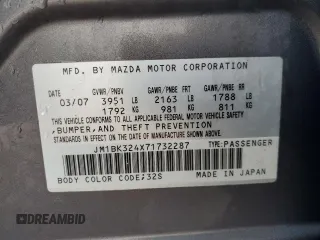 2007 Mazda 3 S Touring with VIN JM1BK324X71732287, listed as a Copart auction lot 43969525 with 211,566 mi miles and Salvage Title. Bid and sale history available at DreamBid. Image 12.