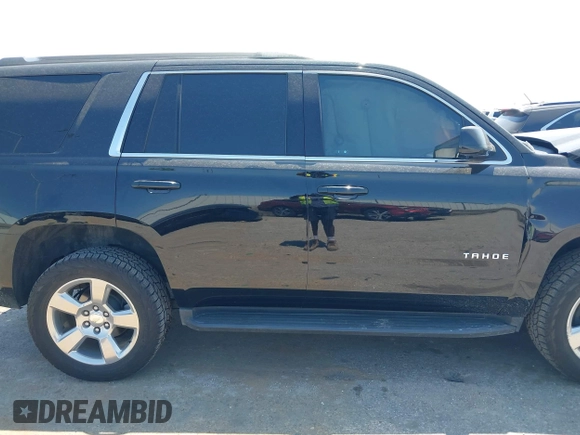 2020 Chevrolet Tahoe LS with VIN 1GNSCAKCXLR293278, listed as a IAAI auction lot 41973191 with 61,907 mi miles and . Bid and sale history available at DreamBid. Image 13.