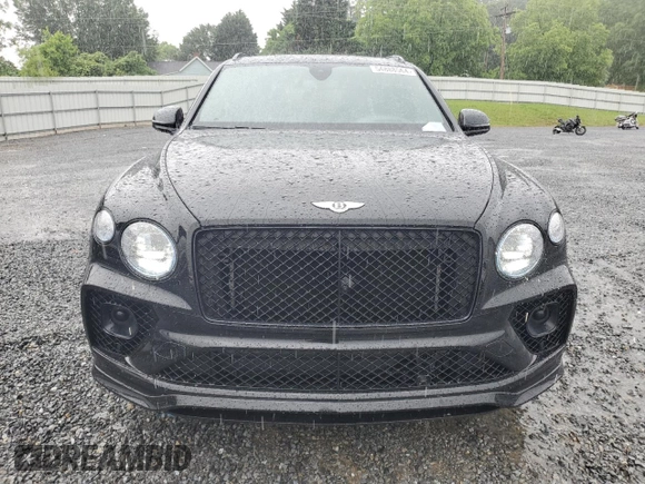 2022 Bentley Bentayga V8 z VIN SJAAM2ZV8NC039607, wystawiony jako Copart lot #54888564 z przebiegiem 15 561 mil mil oraz . Historia ofert i sprzedaży dostępna na DreamBid. Obrazek 5.