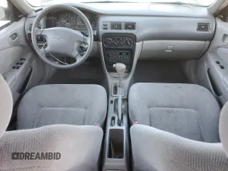 2002 Chevrolet Prizm z VIN 1Y1SK52842Z413505, wystawiony jako Copart lot #69058464 z przebiegiem 100 014 mil mil oraz Tytuł czysty. Historia ofert i sprzedaży dostępna na DreamBid. Obrazek 8.