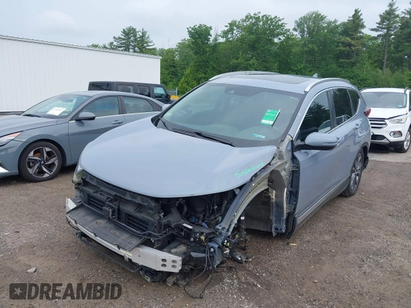 2021 Honda CR-V Touring with VIN 7FART6H91ME022993, listed as a IAAI auction lot 42439344 with 30,477 mi miles and . Bid and sale history available at DreamBid. Image 2.