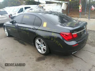 2013 BMW 7 Series 750Li xDrive with VIN WBAYF8C51DD140657, listed as a IAAI auction lot 32751348 with 128,816 mi miles. Bid and sale history available at carsss.com. Image 3.