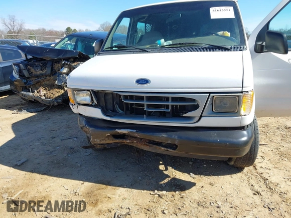 1999 Ford Econoline Cargo with VIN 1FTRE14W0XHB64440, listed as a IAAI auction lot 41645551 with 239,114 mi miles. Bid and sale history available at carsss.com. Image 6.