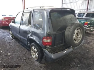 2002 Kia Sportage with VIN KNDJB723X25134499, listed as a IAAI auction lot 41273605 with 1 mi miles. Bid and sale history available at carsss.com. Image 3.