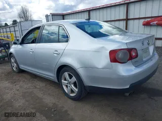 2009 Volkswagen Jetta Sedan SE with VIN 3VWRZ71K39M090645, listed as a IAAI auction lot 41999413 with 244,687 mi miles. Bid and sale history available at carsss.com. Image 3.