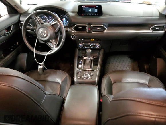 2018 Mazda CX-5 Grand Touring with VIN JM3KFBDM6J0455993, listed as a Copart auction lot 61414275 with 77,570 mi miles and Salvage title. Bid and sale history available at DreamBid. Image 8.