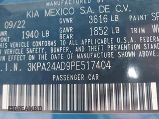 2023 Kia Rio LX with VIN 3KPA24AD9PE517404, listed as a IAAI auction lot 41609216 with 191,122 mi miles. Bid and sale history available at carsss.com. Image 9.