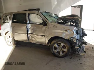 2014 Honda Pilot EX-L with VIN 5FNYF3H56EB024735, listed as a IAAI auction lot 41286284 with 101,221 mi miles. Bid and sale history available at carsss.com. Image 6.